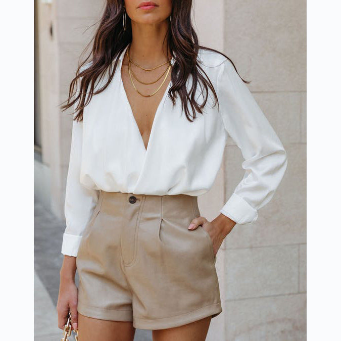 Damer stiliga högmidjade shorts med elegant färgningsteknik och praktiska fickor Mirla-Eva Jonsson