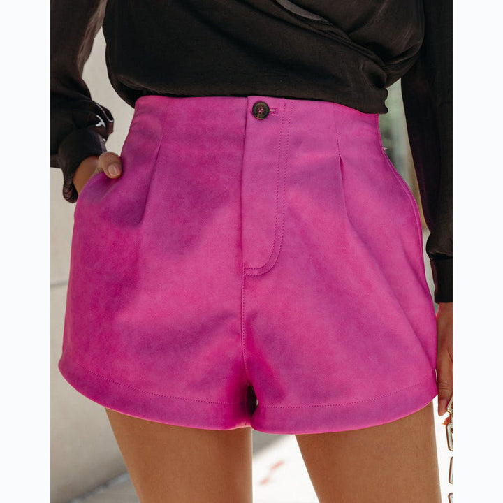 Damer stiliga högmidjade shorts med elegant färgningsteknik och praktiska fickor Mirla-Eva Jonsson