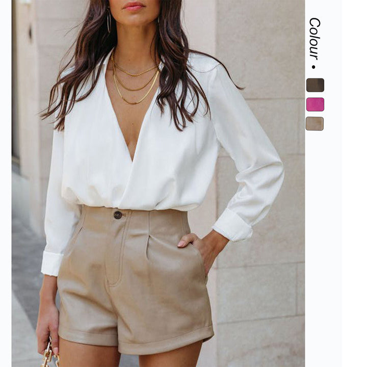 Damer stiliga högmidjade shorts med elegant färgningsteknik och praktiska fickor Mirla-Eva Jonsson