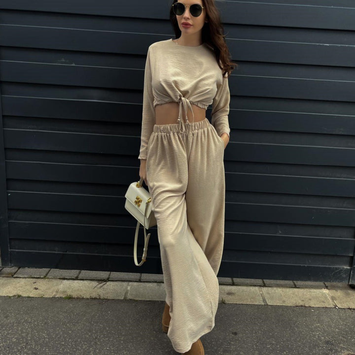 Damer stiliga set med raffinerad crop-blus och vida byxor Mirla-Eva Jonsson