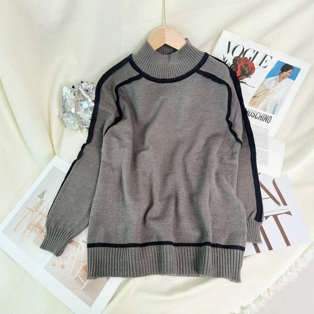 Damer stiliga turtle neck tröja med kontrasterande fåll Mirla-Eva Jonsson