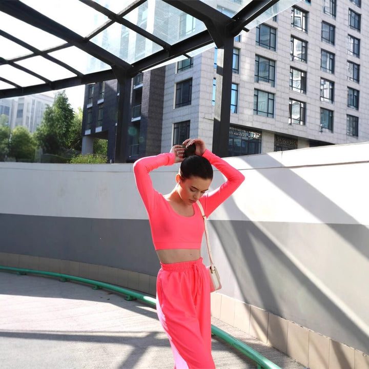 Damer stiligt tvådelat set med långärmad crop-top och vida palazzo-byxor Mirla-Eva Jonsson