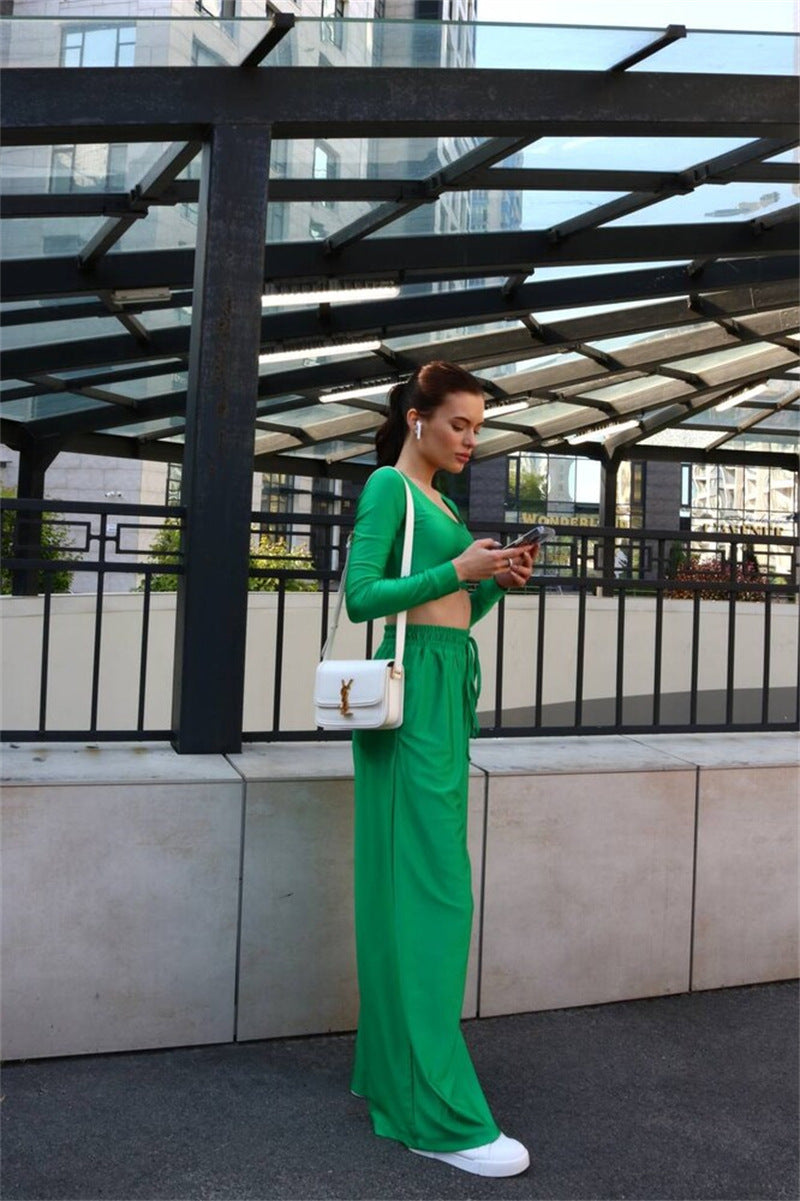 Damer stiligt tvådelat set med långärmad crop-top och vida palazzo-byxor Mirla-Eva Jonsson