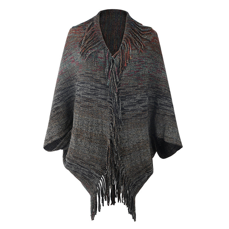 Damer stilren poncho med fransig fåll och strukturerad design Mirla-Eva Jonsson
