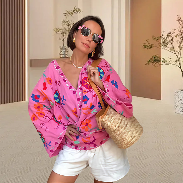 Damer strandkimono med färgglad blommönster och avslappnad passform Mirla-Eva Jonsson