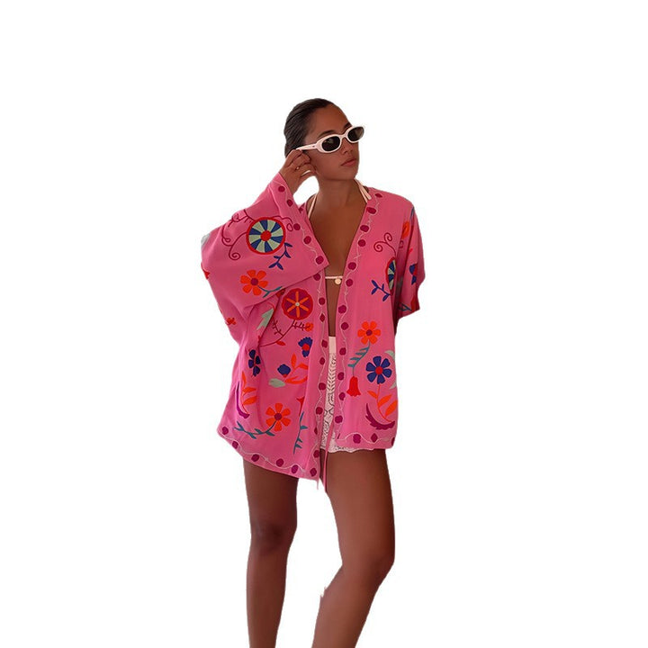 Damer strandkimono med färgglad blommönster och avslappnad passform Mirla-Eva Jonsson