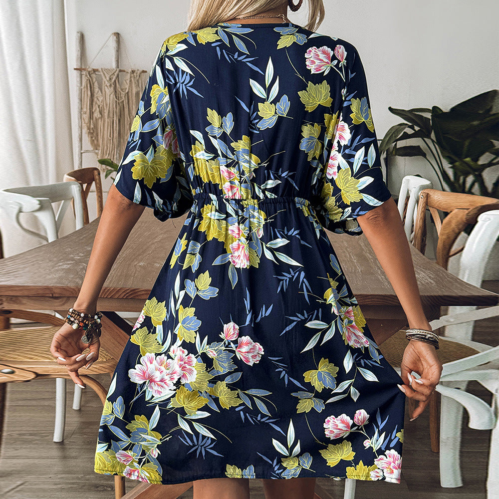 Damer strandtunika med blommiga detaljer och sofistikerad snitt Mirla-Eva Jonsson