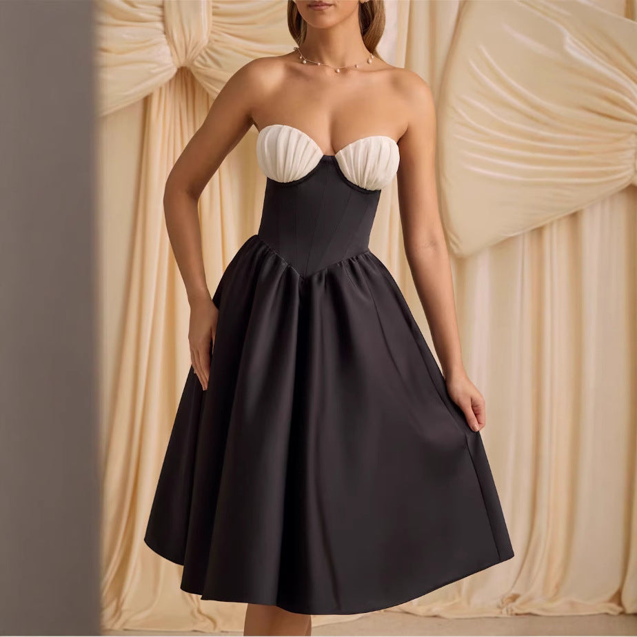 Damer strapless cocktailklänning med voluminös kjol och elegant överdel Mirla-Eva Jonsson