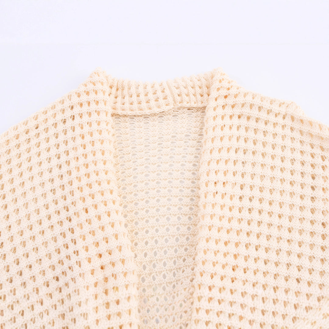 Damer strickcardigan med asymmetrisk design och elegant midjebälte Mirla-Eva Jonsson