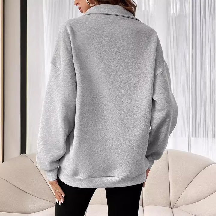 Damer sweatshirt med halv dragkedja och avslappnad passform Mirla-Eva Jonsson