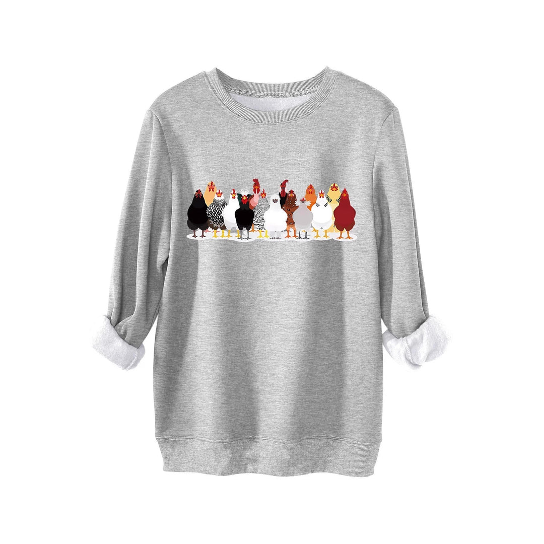 Damer sweatshirt med lekfullt hönsmotiv Mirla-Eva Jonsson