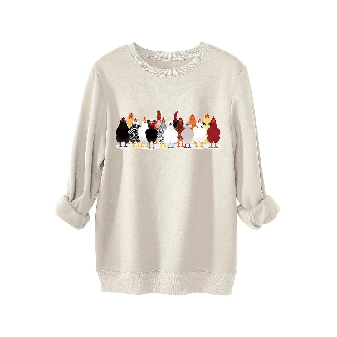 Damer sweatshirt med lekfullt hönsmotiv Mirla-Eva Jonsson
