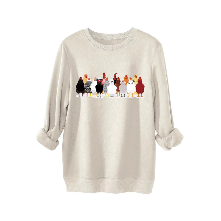 Damer sweatshirt med lekfullt hönsmotiv Mirla-Eva Jonsson