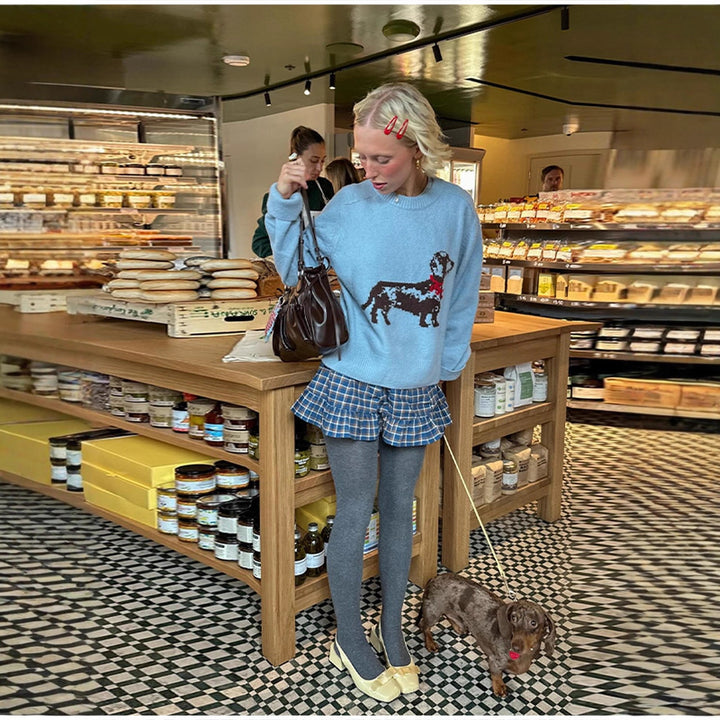 Damer sweatshirt med lekfullt hundmotiv och ribbade ärmar Mirla-Eva Jonsson