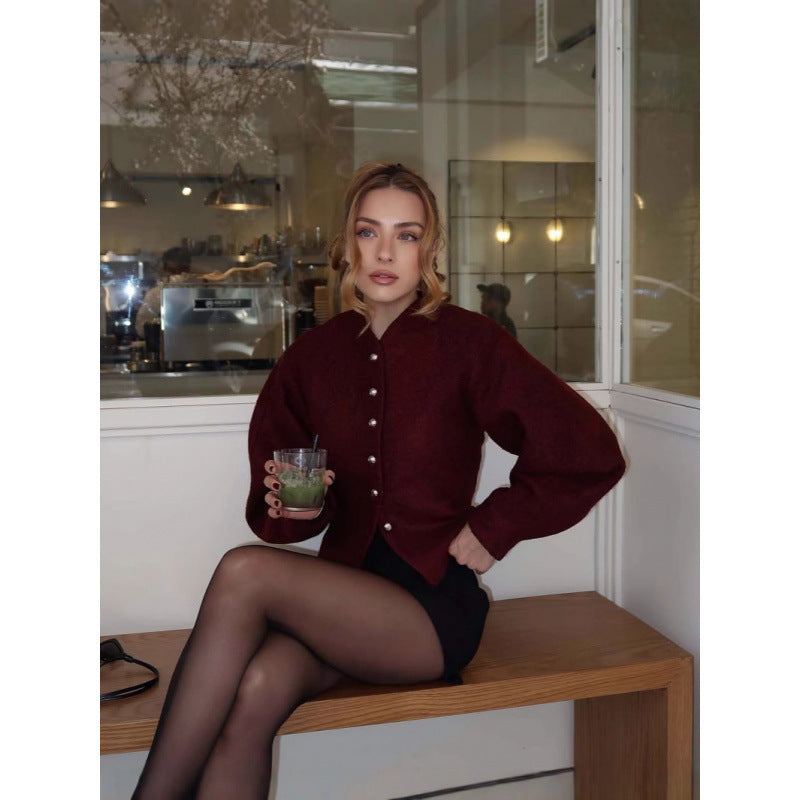 Damer tidlös cardigan med eleganta knappar och voluminösa ärmar Mirla-Eva Jonsson