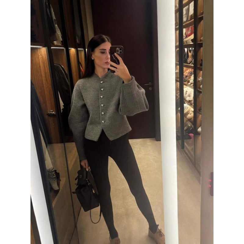 Damer tidlös cardigan med eleganta knappar och voluminösa ärmar Mirla-Eva Jonsson