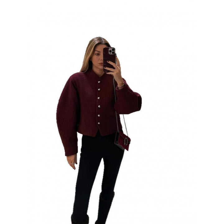 Damer tidlös cardigan med eleganta knappar och voluminösa ärmar Mirla-Eva Jonsson