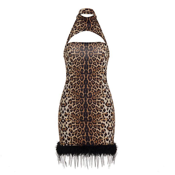 Damer topp med leopardmönster och elegant fjäderdetalj Mirla-Eva Jonsson
