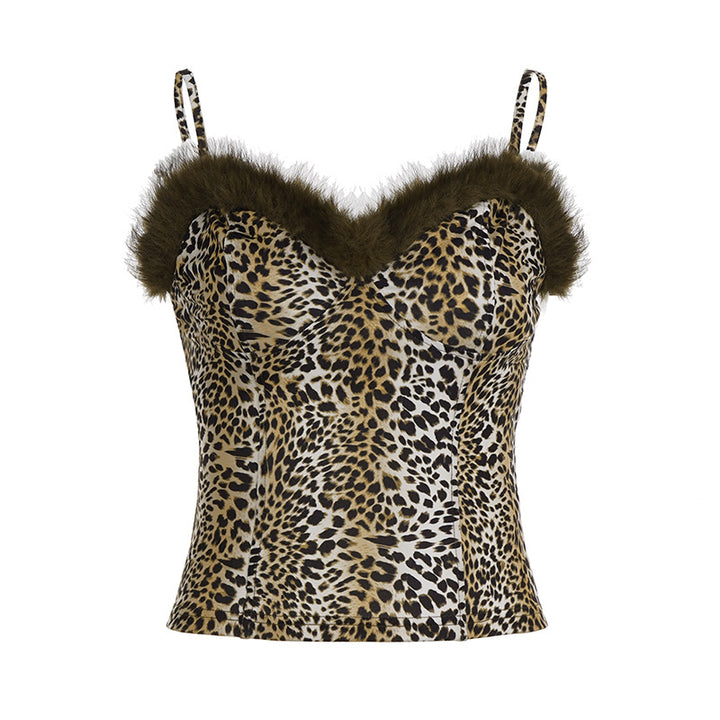 Damer topp med leopardmönster och elegant pärytterství Mirla-Eva Jonsson