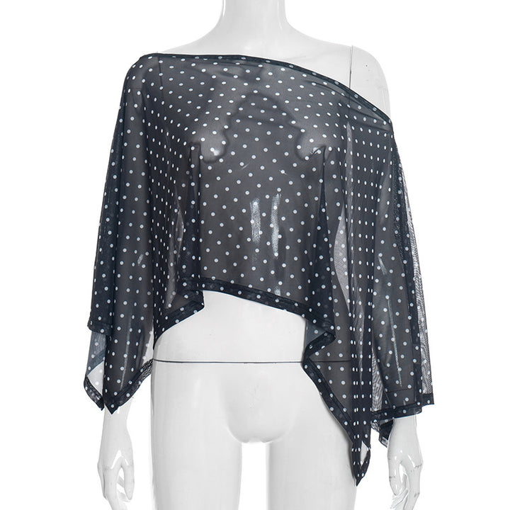 Damer transparent överdel med asymmetrisk skärning och polka prickar Mirla-Eva Jonsson
