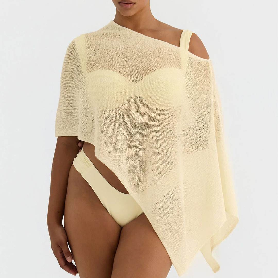 Damer transparent strandkappa med asymmetrisk skärning och elegant design Mirla-Eva Jonsson