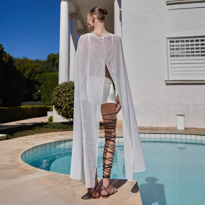 Damer transparent strandoutfit med trendiga längder och snördetaljer Mirla-Eva Jonsson