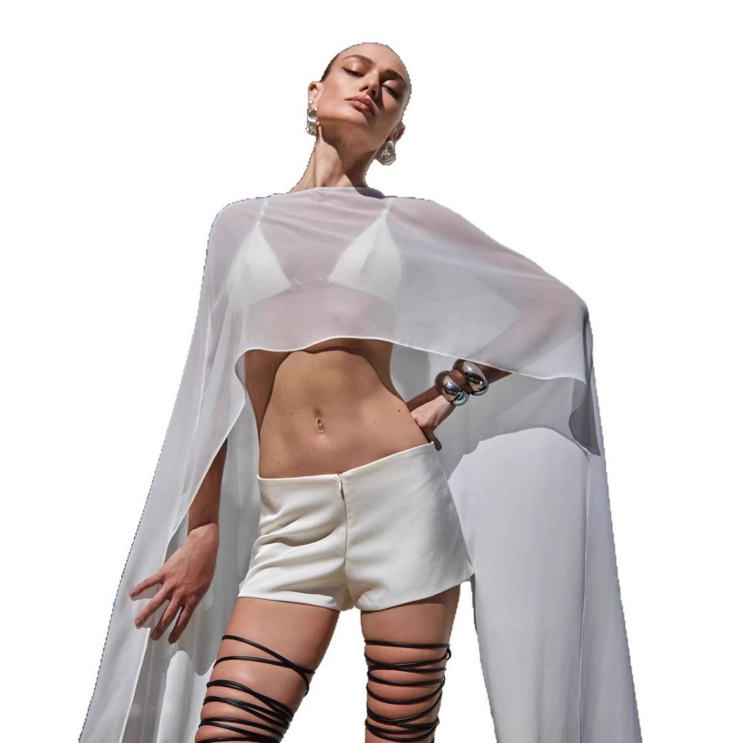 Damer transparent strandoutfit med trendiga längder och snördetaljer Mirla-Eva Jonsson