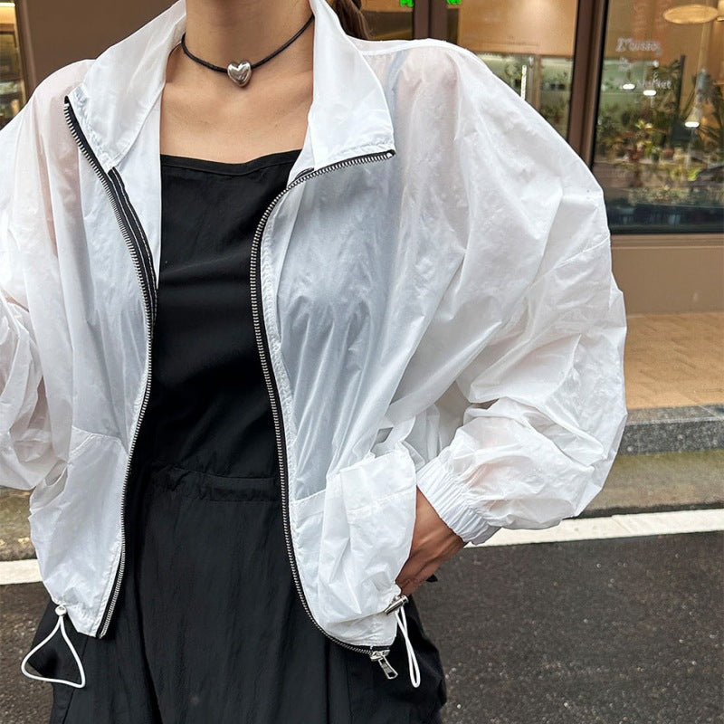 Damer transparent vindjacka med dragkedja Mirla-Eva Jonsson