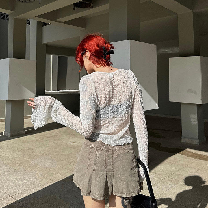 Damer trendig Crop-blus med snörningsalternativ och transparent design Mirla-Eva Jonsson