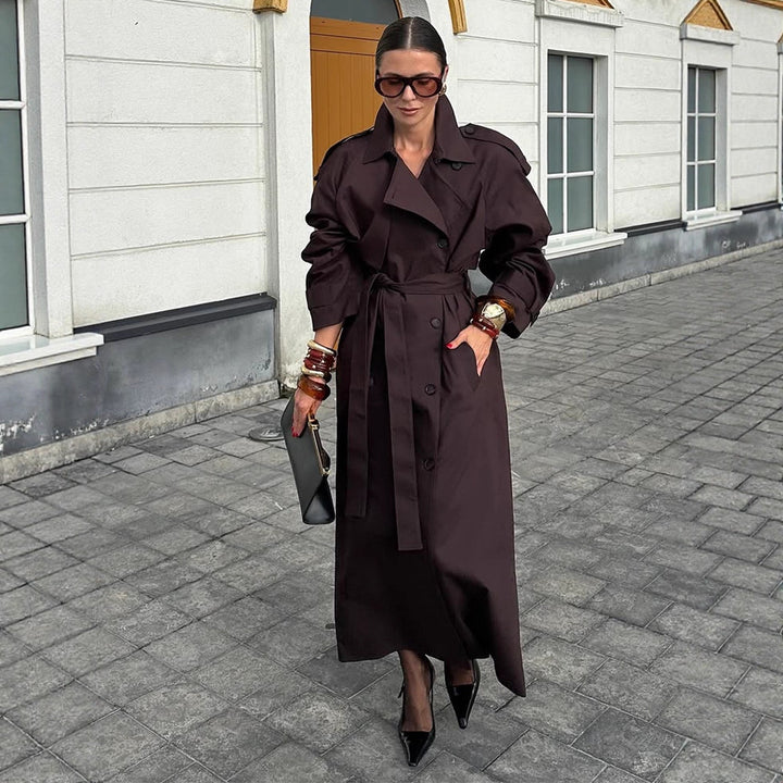 Damer trendig trenchcoat med bälte och voluminösa ärmar Mirla-Eva Jonsson