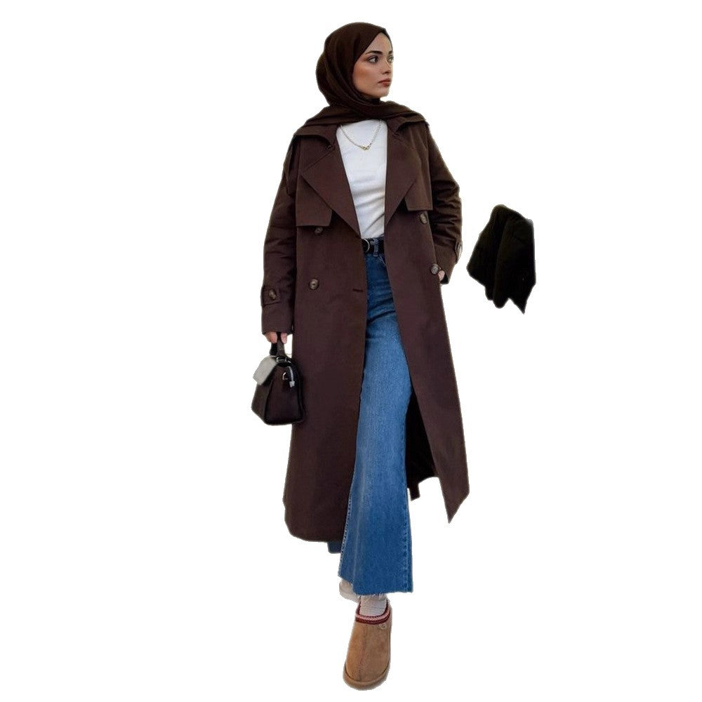 Damer trendig trenchcoat med bälte och voluminösa ärmar Mirla-Eva Jonsson
