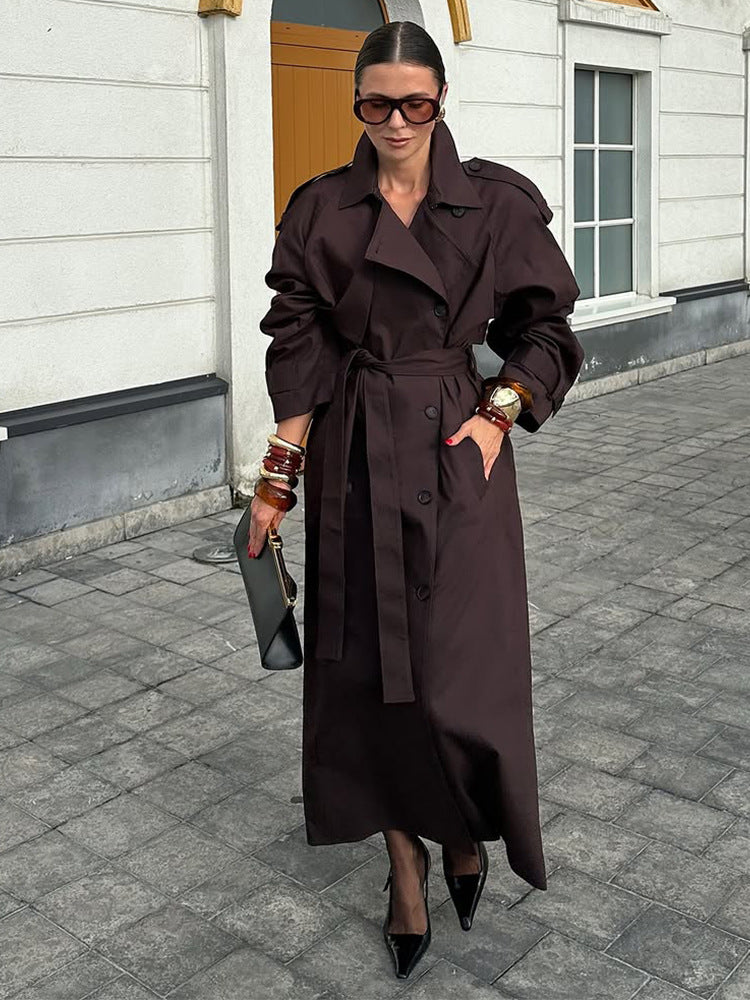 Damer trendig trenchcoat med bälte och voluminösa ärmar Mirla-Eva Jonsson