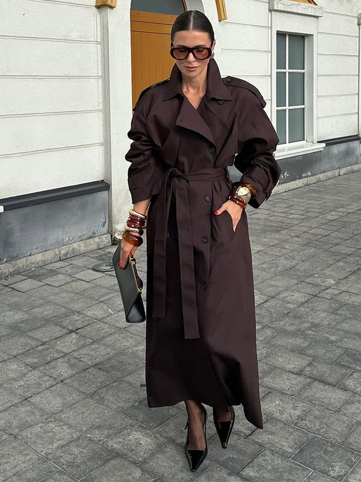Damer trendig trenchcoat med bälte och voluminösa ärmar Mirla-Eva Jonsson