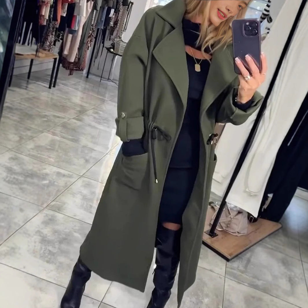 Damer trendy övergångskappa med midjesnörning och praktiska fickor Mirla-Eva Jonsson