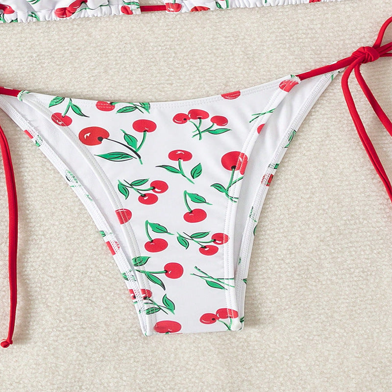 Damer triangel-bikini med knytning och lekfullt körsbärsdesign Mirla-Eva Jonsson