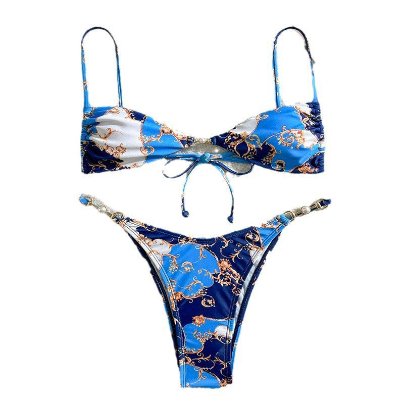Damer triangelbikini med elegant design och gyllene accenter Mirla-Eva Jonsson
