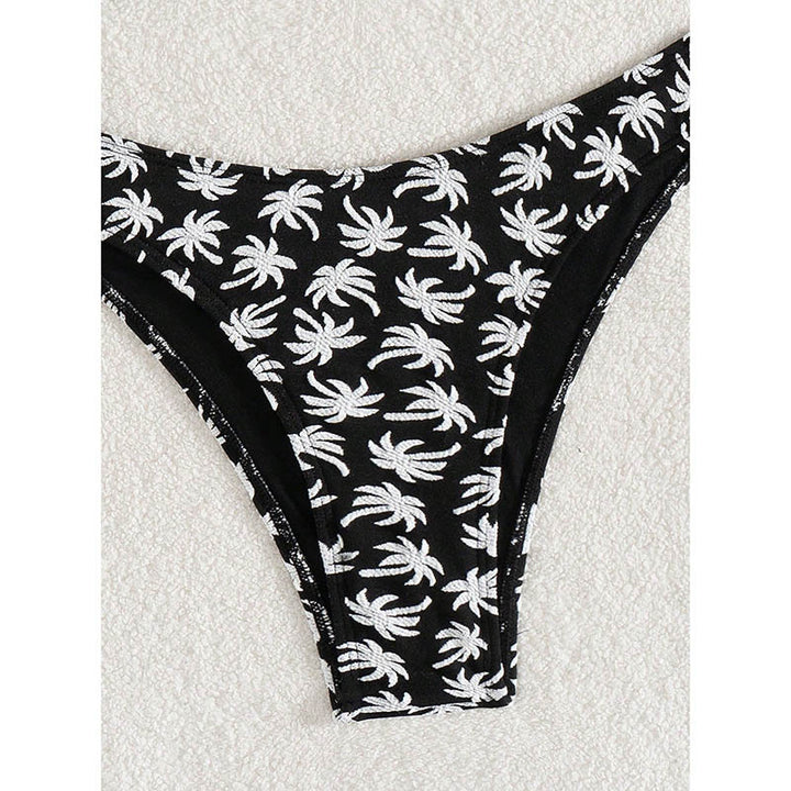 Damer triangeldragts-bikini med glad palmmönster och hög benutskärning Mirla-Eva Jonsson