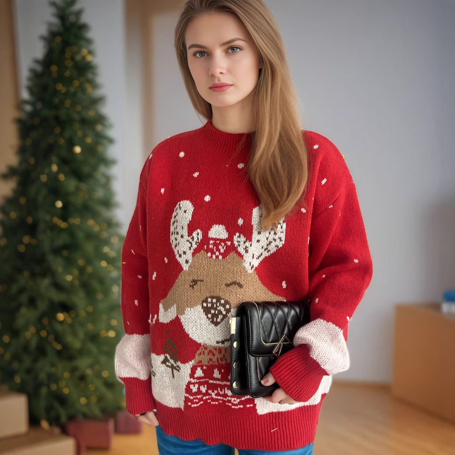 Damer tröja med festligt renmotiv och himmelskt design Mirla-Eva Jonsson