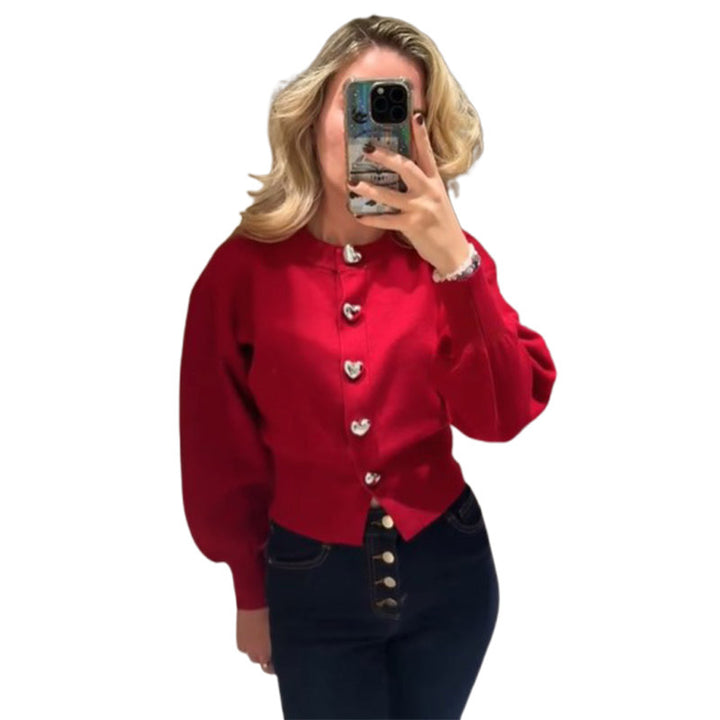 Damer tröja med hjärtknappar och puffärm Mirla-Eva Jonsson