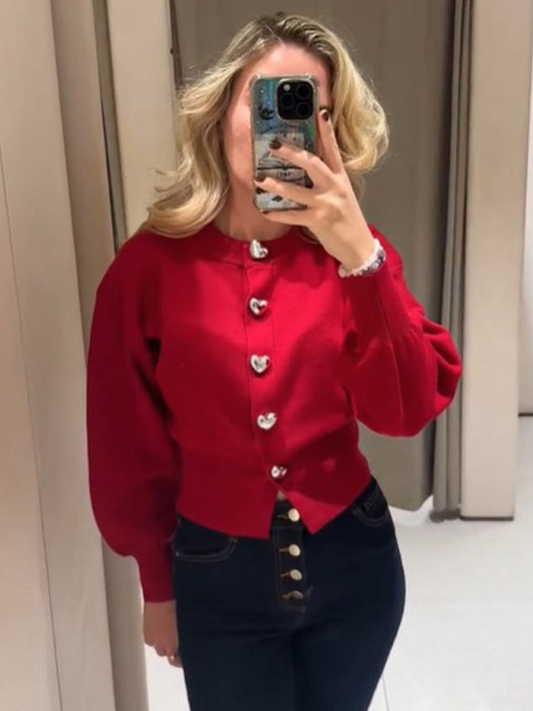 Damer tröja med hjärtknappar och puffärm Mirla-Eva Jonsson