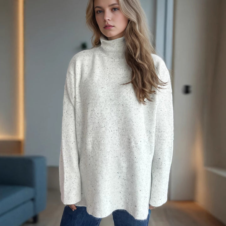 Damer tröja med hög krage och asymmetrisk fåll Mirla-Eva Jonsson