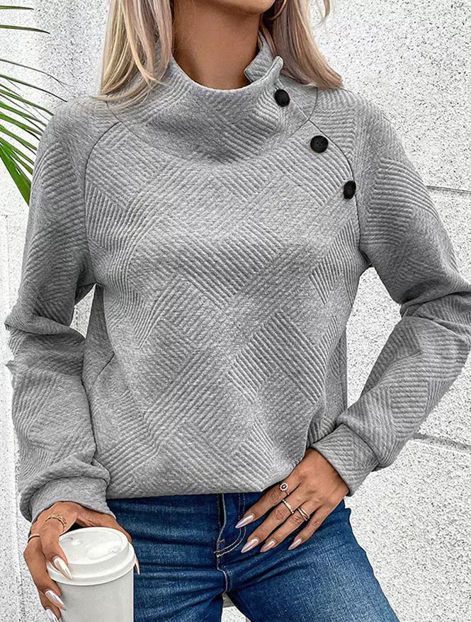 Damer tröja med hög krage och stiliga knappar Mirla-Eva Jonsson