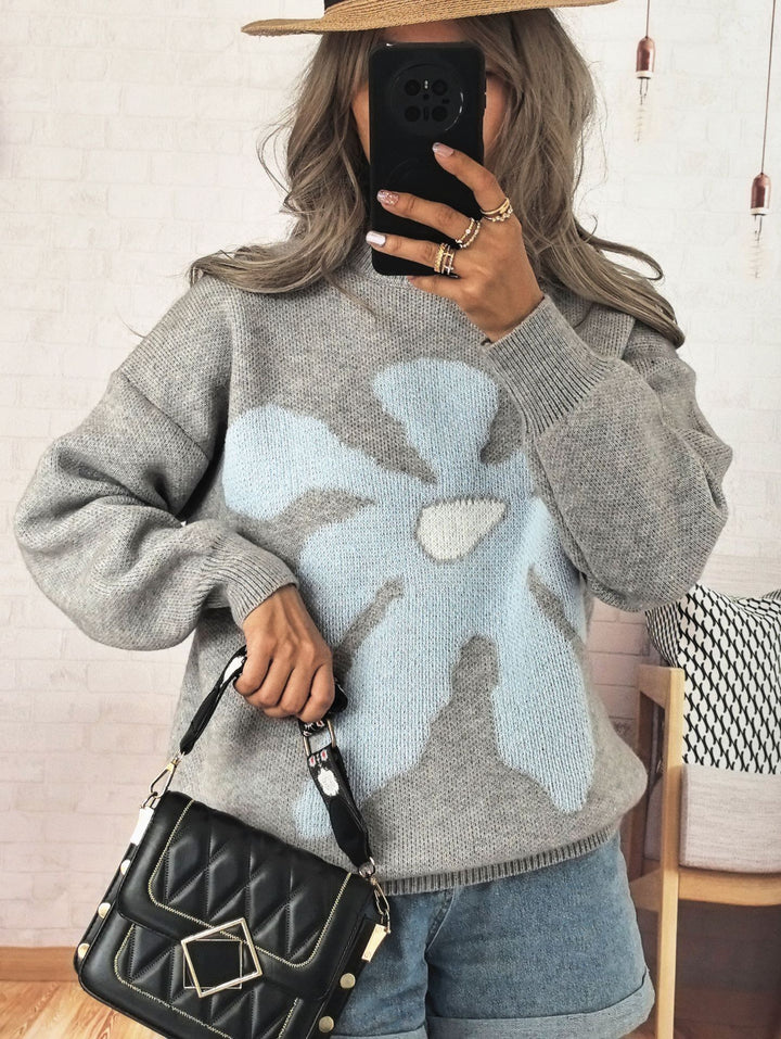 Damer tröja med iögonfallande blommotiv och avslappnad passform Mirla-Eva Jonsson