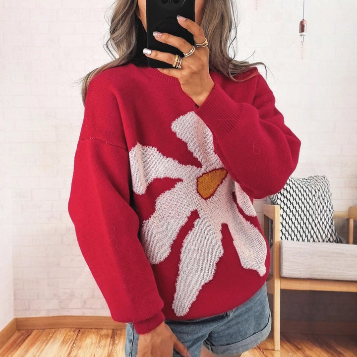 Damer tröja med iögonfallande blommotiv och avslappnad passform Mirla-Eva Jonsson