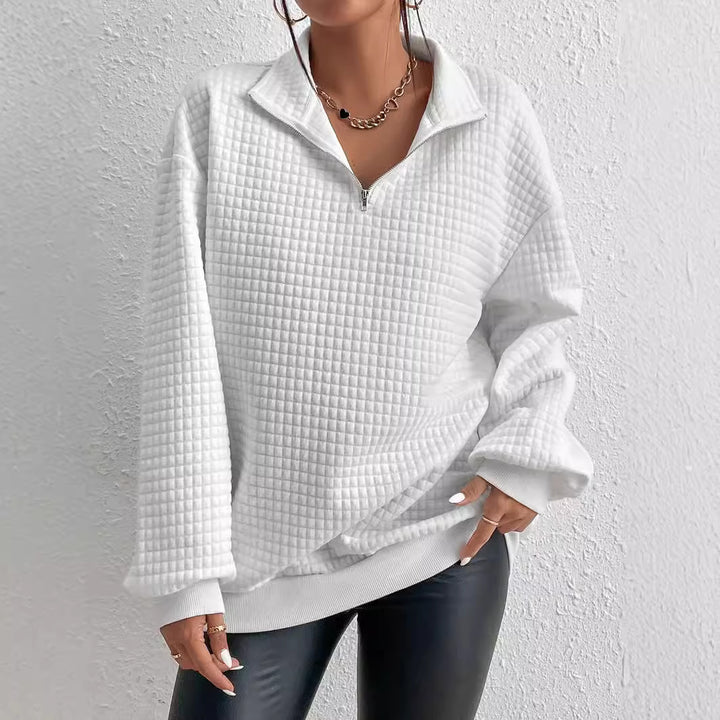 Damer tröja med strukturerad design och kort dragkedja Mirla-Eva Jonsson