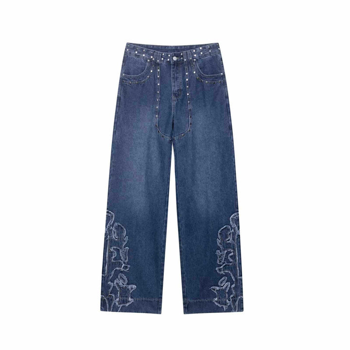 Damer utsvängda jeans med blommönstrade broderier och dekorativa knapppdetaljer Mirla-Eva Jonsson