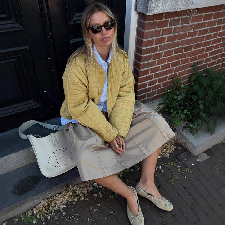 Damer vadderad övergångsjacka med avslappnad passform och stora fickor Mirla-Eva Jonsson
