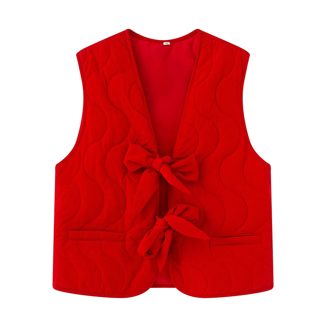 Damer vadderad väst med praktisk knapplåsteknik och moderiktiga detaljer Mirla-Eva Jonsson