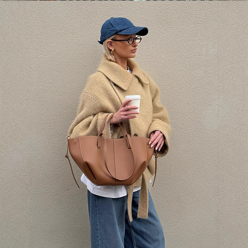 Damer varma och stiliga oversized ulljacka Mirla-Eva Jonsson