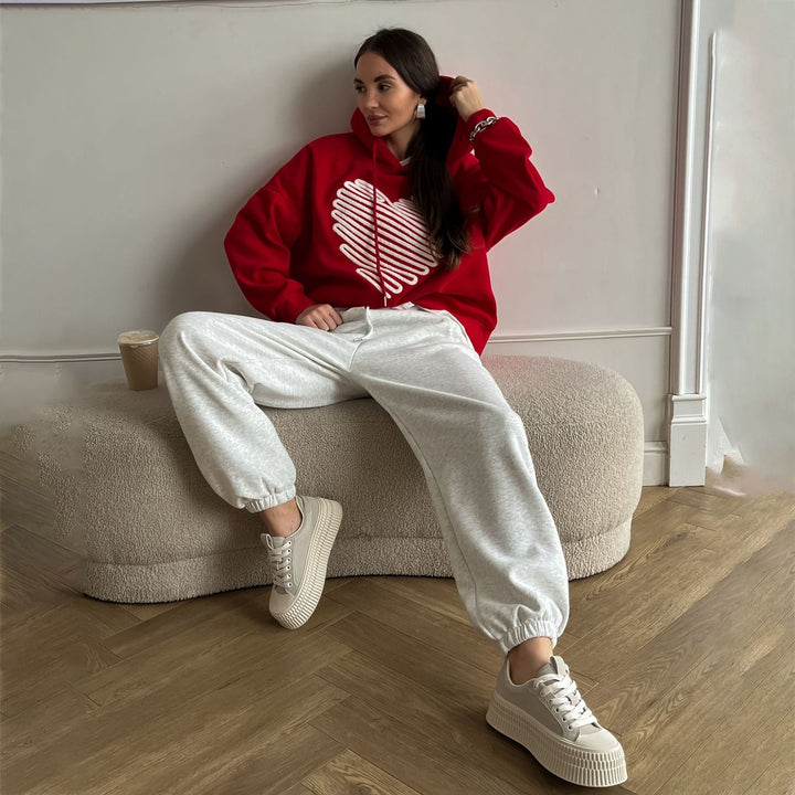 Damer vävd hoodie med hjärttryck Mirla-Eva Jonsson